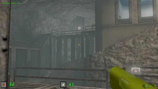 Green Nation first-person view overlooking a foggy industrial canyon with metal walkways, stairs, rocky walls, and distant yellow plastic army men.