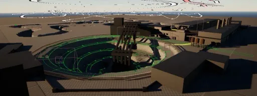 Supervolito blockout screenshot of Dry Run, overlooking the mining pit area with circular route guides, ramps, industrial structures, and track barriers.